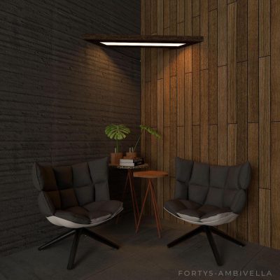 A versatile Forty5 lamp with a 45° angle design, made from MDF and fiberglass, functioning as both a light source and a corner shelf.